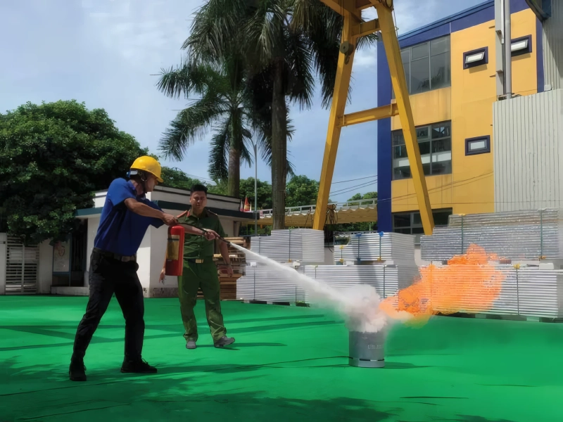 Phu Son staff at fire safety training with the fire service
